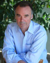 joseph culliton_headshot_blue shirt_sitting