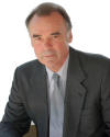 joseph culliton_headshot_grey suit